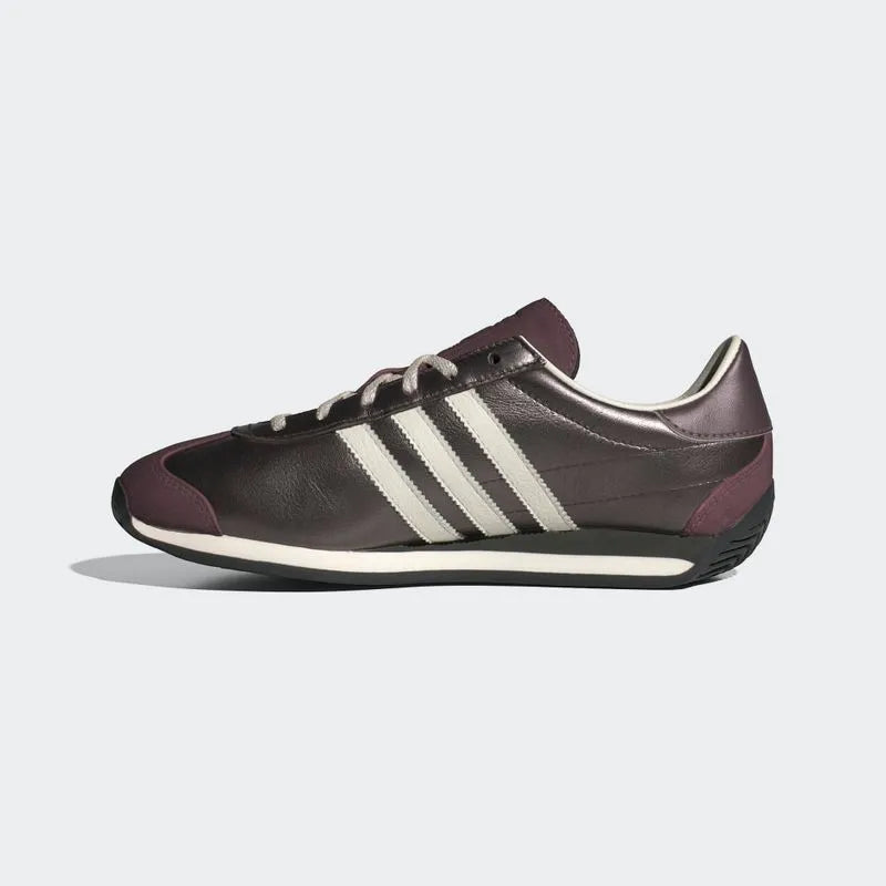 
                      
                        Zapatilla Country OG W
                      
                    